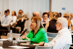 Professional videography capturing interactive conference session