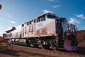 Mining Day 22-11-23 TDM LR-92 Professional videography train on tracks under clear blue sky