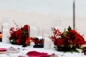 Professional videography dining table with red rose centerpiece