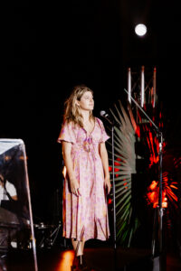 Professional videography, photography, woman performing on stage