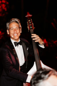 Person Playing a Guitar at Event