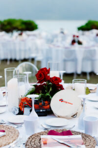 Professional videography of elegant event table with red roses