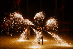 Professional videography capturing stunning fire performance night