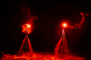 Professional videography capturing night water jetpack show