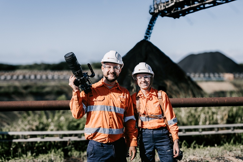 TDM crew in high-visibility clothing on a mine site