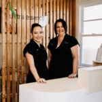 Business brand photography – staff at reception desk