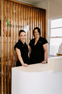 Business brand photography – staff at reception desk