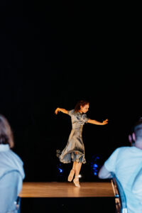 Welcome Dinner 22-Full Gallery-TDM LR-264 Professional videography captures elegant dancer on stage