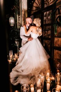 Professional videography photography drone footage of wedding couple