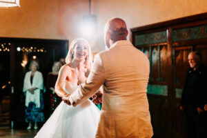 Professional videography for joyful wedding couple's first dance