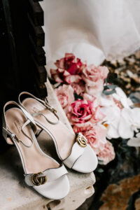 Professional videography photography drone footage bridal shoes roses