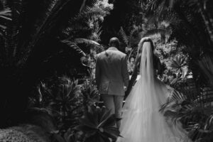 Professional videography and photography wedding couple in garden