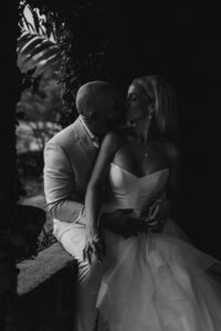 Professional videography, photography, and drone footage couple embrace