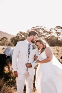 Professional videography and photography of outdoor wedding scene