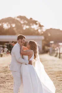 Professional videography captures romantic wedding couple outdoors