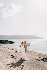 Professional videography photography and drone footage of a beach wedding