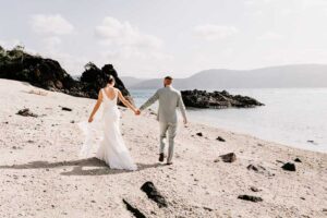 Professional videography, photography, and drone footage beach wedding scene