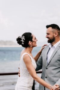 Professional videography capturing a joyful couple by the sea