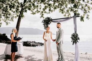 Professional videography photography and drone footage at beach wedding