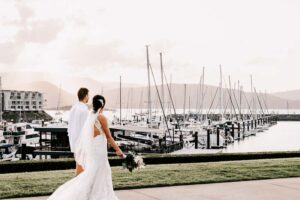 Professional videography photography and drone footage of marina wedding