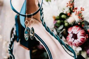 Professional videography, photography, stylish earrings on shoes