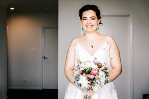 Professional videography Bride with bouquet in elegant setting