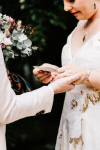 Professional videography wedding couple exchanging rings ceremony