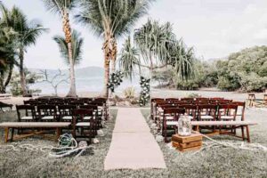 Professional videography outdoor wedding setup by the beach