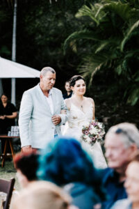 Professional videography captures outdoor wedding ceremony scene