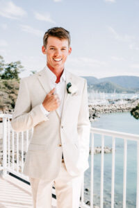 Professional videography, photography, groom on oceanfront deck