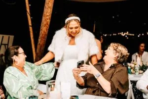 Professional videography family celebrating wedding reception joy