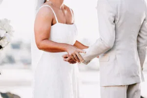 Professional videography, photography, couple holding hands outdoors