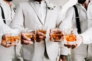 Professional videography captures elegant wedding toast moment