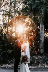 Professional videography capturing a romantic outdoor wedding scene