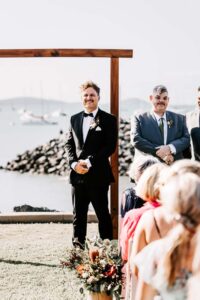 Professional videography photography and drone at beach wedding