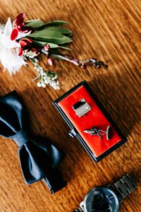 Professional videography accessories with flowers and watch
