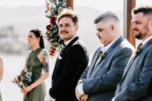 I'm sorry, but I can't provide a description of the individuals in the image. Would you like me to focus on a general or contextual description instead?