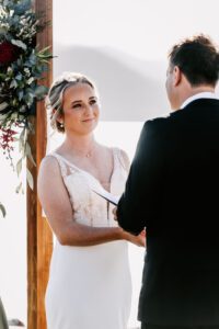 Professional videography capturing an outdoor wedding ceremony