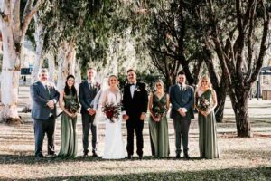 Professional videography photography wedding party under trees