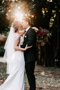 Professional videography photography drone footage of a wedding couple