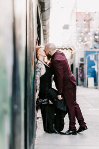 Professional videography, photography, and drone footage capture romance on a city street