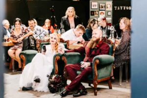 Professional videography capturing joyous wedding reception moments