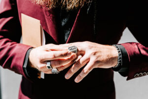 Professional videography capturing stylish dressed bearded man