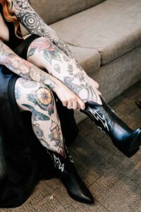 Professional videography, photography, woman with tattooed legs