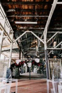 Professional videography showcasing rustic wedding venue setup