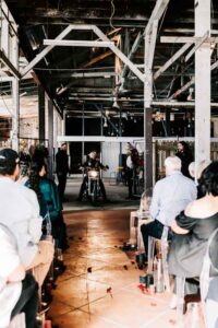 Professional videography photography and drone of indoor ceremony