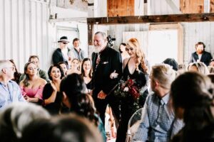 Professional videography capturing joyous wedding ceremony moments