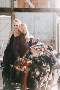 Professional videography with a stylish couple on a motorcycle