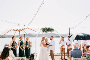 Professional videography photography drone footage at beach wedding