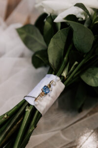 W+R 12-08-23 Th3rd Dimension Media WR-104 Professional videography view of bridal bouquet with jewelry charm